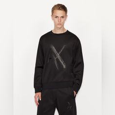 This Crew Neck Sweatshirt Is Immediately Recognisable, Thanks To Contrasting Details And A Front And Center, Oversized Logo. The Unique, Innovative A|X Touch Adds Distinction To This Evergreen Style. Product Code 6kzmlrzjkqz11200 Details & Special Features Cotton Blend, Crew Neck Sweatshirt Contrasting Inserts And Oversized Logo Rib Knit Collar, Cuffs And Hem Fabric: 52% Polyester, 41% Cotton, 7% Elastane Imported Machine Wash 6kzmlr-Zjkqz Luxury Hype Brand High Demand Brand Trending Brand Exclu Modern Long Sleeve Sweatshirt With Logo, Modern Long Sleeve Sweatshirt With Logo Print, Modern Crew Neck Sweatshirt For Spring, Modern Black Sweatshirt With Relaxed Fit, Black Modern Relaxed Fit Sweatshirt, Modern Black Relaxed Fit Sweatshirt, Armani Exchange Men, Striped Hoodie, Zip Up Sweater