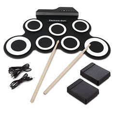 electronic drum set with accessories including sticks and headphones