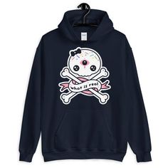 A pastel goth hoodie with kawaii skull.This hooded sweatshirt looks great on both men and women.Perfect for people who love looking cute and questioning the true nature of reality.Runs large for women.Fits men true to size.Lined hoodDouble stitched throughoutSoftHas a pocketRuns large for womenReduced pillingPlus sizes available up to 5XOriginal artwork not available in storesSizing tip: Take a shirt that fits you the way you like, lay it flat and measure the width (from under one arm to under t Kawaii Streetwear Hoodie With Letter Print, Casual Hooded Sweatshirt With Skull Print, Kawaii Graphic Print Hoodie For Fall, Fall Kawaii Hoodie With Graphic Print, Casual Skull Print Hoodie, Fun Cotton Hooded Hoodie, Fun Cotton Hoodie, Cute Cotton Hoodie For Streetwear, Casual Cotton Hoodie With Skull Print