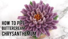 a purple flower with the words how to pipe buttercream chrysanthemum