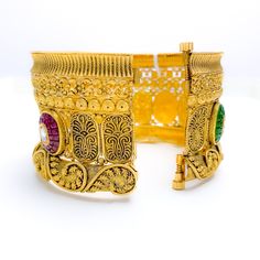 PRODUCT DETAILS Gold Purity(karat): 22k Item Weight(grams): 61.5 Item Finish: Oxidized Stone: Kundan Bangle Size: 2.5 Bangle Opening(diameter): ﻿2.3" Openable: Yes - Screw w/ Hinge Number Of Pieces: 1 Bangle 22k Gold Temple Jewelry Bracelets For Festivals, Fusion Style Ceremonial Bangle Bracelets, Hand Set 22k Gold Festive Bracelets, 22k Gold Bangle Bracelet For Festive Occasions, Festive Gold Plated Openable Bracelets, Ceremonial 22k Gold Tilla Bangle, Festive 22k Gold Bangle Bracelet, Temple Jewelry Style Ceremonial Bangle, Festive Openable Gold-plated Bracelets