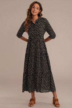 Black Floral Half Sleeve V Neck Maxi Dress - Petallush Flowy A-line Maxi Dress For Fall, Modest Flowy Rayon Maxi Dress, Relaxed Fit Midi Dress For Fall Vacation, Chic Floral Print High-low Dress, Chic Floral Print Dresses With High-low Hem, Chic Floral Print Dress With High-low Hem, Flowy Midi Dress With Ruffle Asymmetrical Hem, Flowy Midi Dress With Asymmetrical Ruffle Hem, Casual Flowy Maxi Dress For Daywear