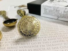 "The Royal Wonderland Wax Seal Stamp Set Head  (stamp head only) Edition - The White Rabbit Pocket Watch Edition with Wonderland Clock background. - Alice in Wonderland Excerpt - The Fish-Footman began by producing from under his arm a great letter, nearly as large as himself, and this he handed over to the other, saying, in a solemn tone, \"For the Duchess. An invitation from the Queen to play croquet.\" The Frog-Footman repeated, in the same solemn tone, only changing the order of the*words a White Rabbit Pocket Watch, Clock Background, Stamp Letter, Writing Book, Book Maker, Stamped Spoons, The White Rabbit, Antique Wax, Wax Burner