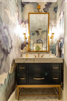 a bathroom with a large mirror above it and a sink in front of the mirror