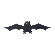 a black bat shaped object on a white background