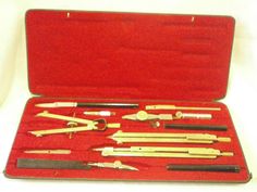 an assortment of tools in a red case