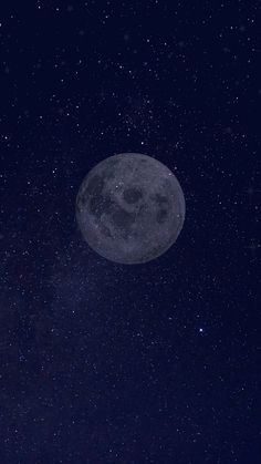 the full moon is shining brightly in the night sky with stars on its side and dark blue skies