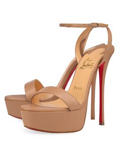 Strappy sandals Nappa leather Heel height: 150mm / 5.9'' Made in Italy ABOUT THE BRAND In 1991 French designer Christian Louboutin opened his first shoe salon in Paris debuting stilettos with his signature red-lacquered soles. Today the label has expanded to include coveted handbags beauty and men's shoes and continues its mission to create styles that inspire confidence and empowerment. Loubiton Heels, Loubi Queen, Trendy High Heels, Shoes Heels Classy, Ankle Strap Sandals Heels, Platform High Heel Shoes, Red High Heels, Leather Platform Sandals, Louboutin Shoes