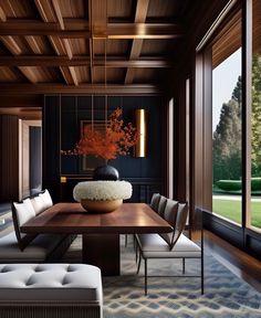 an elegant dining room with wood paneling and large windows overlooking the golf course in the distance