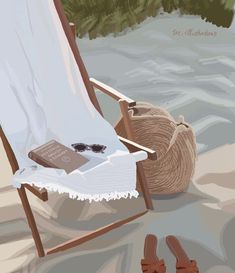 a beach chair with a book and sunglasses on it