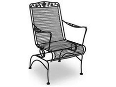 a wrought iron chair with arms and legs