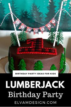 a birthday cake is decorated with trees and buntings for the lumberjack birthday party