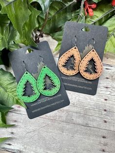 "These tear drop earrings are laser cut and engraved. A festive little tree is cut out of the center, with faux stitching around the tree and outside edge.  1.5\" inch long teardrop Very lightweight  Stainless steel ear wires.  *check out my shop for more earrings and other handmade gifts* Wiredbyjenniferlynn.Etsy.Com  --home decor--earrings--keychains--ornaments--gifts-- *visit me on Facebook! Message me for discounts, like my page to stay in touch and see new items!* facebook.com/HandcraftedBy Wooden Laser Cut Ideas, Glowforge Gift Ideas, Leather Earrings Ideas, Christmas Earrings Diy, Christian Boutique, Diy Christmas Earrings, Cricut Jewelry, Cricut Earrings, Glowforge Projects