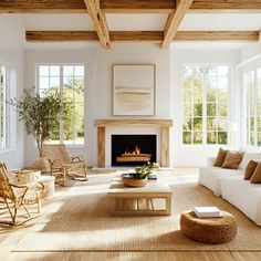 a living room filled with furniture and a fire place in the middle of the room