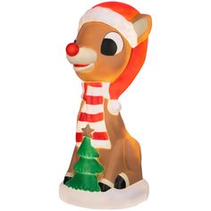 a glass figurine with a christmas tree on it