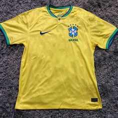 I Have Up To 4xl But The Jerseys Come Some So I Recommend Going Up One Size Brazil Football Jersey, Brazil Shirt Outfit Men, Vintage Brazil Jersey, Yellow Sports Shirt For Summer, Yellow Summer Sports Shirt, Brazil Jersey Outfit Men, Nike Yellow Short Sleeve T-shirt, Yellow Nike T-shirt With Short Sleeves, Nike Yellow Summer Tops