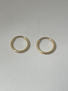 Beautiful 14K rolled gold hoop earrings 1.25mm x 12mm Classic Gold Cartilage Earrings, 14k Gold Round Cartilage Earrings, 14k Yellow Gold Round Cartilage Earrings, Dainty Yellow Gold Round Cartilage Earrings, Fine Jewelry Hypoallergenic Round Hoop Earrings, Gold Hypoallergenic Round Cartilage Earrings, 14k Gold Cartilage Earrings For Anniversary, 14k Gold Small Hoop Cartilage Earrings For Anniversary, Hypoallergenic Round Huggie Earrings