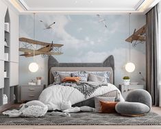 a bedroom with an airplane mural on the wall and bed in the middle, along with other furniture