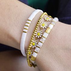 This dainty little daisy bracelet will never tarnish! It's made of stainless steel and enamel, so you can wear it with confidence. You can choose between gold or silver for the base metal color, and there are multiple color options for the flowers. Plus, this bracelet is adjustable, so it should fit almost anyone! Live in it, love it, and wear it proudly knowing it is made with high-quality materials. Dainty Flower Bracelets With Adjustable Chain, Dainty Adjustable Flower Chain Bracelet, Diasy Chain Bracelet, Spring Flower-shaped Jewelry With Adjustable Chain, Casual Multicolor Flower-shaped Stretch Bracelet, Flower Chain, Daisy Bracelet, Twisted Bracelet, Mens Leather Bracelet