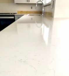 a white counter top in a kitchen