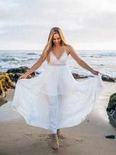 Whether you call a beach town your home or you’re planning a tropical vacation, our breezy Sicilia maxi dress is a must-have pick. The halter V-neck and delicate lace details make this an effortless and elegant day-to-night style. Adjustable halter strap Lace details at neck and waist Side on-seam pockets Back zip closure Partially lined 100% Rayon Handmade in Thailand Flowy Maxi Dress With Lace-up Back For Beach, White Maxi Dress With Lace-up Back, Beach Maxi Dress With Strappy Lace-up Back, Spring Beach Maxi Dress With Hollow-out Details, Bohemian White Maxi Dress With Hollow-out Details, Pineapple Dress, Bohemian Maxi, Halter Strap, Bohemian Maxi Dress