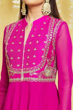 Pink silk flared anakali kurta adorned with dori embroidery on bodice. Comes with matching plain churidar and sequined dupatta.
Components: 3
Pattern: Embroidered
Type Of Work: Gota, Dori
Neckline: Mandarin Collar
Sleeve Type: Churidar
Fabric: Silk
Color: Pink
Other Details: 
Threadwork placket
Pleated flared anarkali waist
Buttoned kurta cuff
Occasion: Wedding,Sangeet - Aza Fashions Anarkali Style Semi-stitched Floor-length Churidar, Anarkali Semi-stitched Choli With Zari Work, Designer Semi-stitched Anarkali Set With Resham Embroidery, Floor-length Resham Embroidered Salwar Kameez For Diwali, Floor-length Churidar With Resham Embroidery, Semi-stitched Floor-length Churidar With Resham Embroidery, Floor-length Semi-stitched Salwar Kameez With Dori Work, Floor-length Semi-stitched Churidar For Diwali, Diwali Semi-stitched Floor-length Churidar