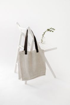 "● STRONG and DURABLE MATERIAL. Linen has a value of timelessness, so you can be sure that this organic tote bag is for a long use. ● STRONG HANDLES. Handles are with rivets which guarantees safe, secure and long-lasting use. ● INNER POCKET with ZIPPER. Your small things (keys, wallet etc.) will be safe while you're shopping or taking your things with you. ● CLASSIC COLORS. The natural linen color is perfect mostly with everything. ● ECOFRIENDLY. Linen fabrics meet OEKO-TEX 100 standards. ● SIMP Everyday Beach Bag With Leather Handles And Canvas Material, Everyday Canvas Beach Bag With Leather Handles, Eco-friendly Tote Weekender Bag For Daily Use, Everyday Canvas Tote Beach Bag, Eco-friendly Tote Weekender Bag, Eco-friendly Weekender Tote Bag For Daily Use, Canvas Tote Beach Bag With Leather Handles, Canvas Beach Bag With Leather Handles Tote, Canvas Beach Bag With Leather Handles