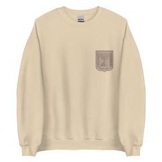 Embrace warmth and pride with our Israel Emblem Unisex Sweatshirt. Tailored for comfort and durability, this classic fit sweater is your perfect companion for the colder months. 🌟 Features: 50% Cotton, 50% Polyester: Enjoy the best of both worlds with a blend that offers breathability and resilience. Pre-Shrunk Fabric: Say goodbye to shrinkage worries; our sweatshirts stay true to size, wash after wash. Classic Fit: Timeless style that suits everyone, providing ease of movement and a flattering silhouette. 1x1 Athletic Rib Knit Collar with Spandex: A snug, yet comfortable collar that retains its shape, enhancing the overall look and feel. Air-Jet Spun Yarn: Experience a luxuriously soft texture that makes you want to wear it all day long. Double-Needle Stitching: Meticulously stitched for Comfy Sweatshirt, Eco Friendly Fashion, Stay True, Fitted Sweater, Staple Pieces, Timeless Style, Unisex Sweatshirt, Rib Knit, Sweat Shirt