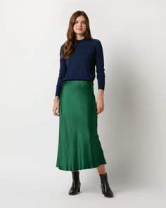 A fluid, midi-length slip skirt made of silky, sheeny charmeuse. The fabric is cut on the bias (diagonally,) which gives it an extra-flattering drape that hugs — but doesn't cling to — your hips and waist. It's got a covered elastic waist that just pulls on, and it looks just as great with a t-shirt as it does with a silk blouse (or the matching top!) Silk Slip Skirt, Clothing Catalog, Slip Skirt, Buckle Shoes, Sweater Gift, Silk Slip, Silk Charmeuse, Liberty Fabric, Sweater Pants