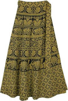 This is an traditional Indian style block print long skirt on a Luxor Gold Yellow background. The beautifully decorated block pattern has animals and floral designs in black. The patterns of pretty paisley, elephants, and flowers are the very essence of boho style, and the luxor gold and black fabric creates a gorgeous contrast that will make you stand out this season. It has a pretty hemline that will flatter any pair of shoes or sandals. Made of cool and comfortable 100% cotton, this gorgeous Elephant Print Fabric, Long Wrap Skirt, Bohemian Wrap, Printed Long Skirt, Hippie Skirts, Gold Outfit, Hippie Look, Gold Wrap, Trendy Skirts