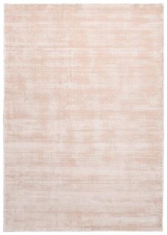 an area rug with light pink tones