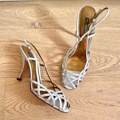 Stunning Dolce & Gabbana Silver Slingback Strappy Sandals!! Beautiful Woven Design Across The Toes, 4 Inch Stiletto Heels, And Ankle Closure. Women’s Size 8.5 (Euro Size 39.5). Made In Italy From Leather. Only Worn Twice!! Wear At The Forefoot But The Heel And Body Of The Shoes Are In Excellent Condition! Silver Color. Gorgeous Shoes! Luxury Leather Sole Slingback Sandals For Party, White Leather Slingback Sandals For Party, Party Slingback Sandals With Ankle Strap And Leather Sole, Designer White Slingback Pumps For Summer, Designer White Slingback Pumps For Evening, Designer Slingback Pumps With Leather Sole For Party, Designer Slingback Sandals With Leather Sole For Evening, White Slingback Pumps For Gala, Designer Slingback Sandals With Open Heel For Evening