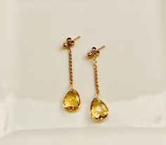 Delicate, feminine and so gorgeous! This is an 18k Gold Filled Earrings featuring a beautiful polished Citrine gemstone. You can see how clear is this stone’s cut. Amazing! Citrine is a great gem to wear to increase motivation! You will love how it will match a lot of your outfits! Product Details: . Size: 2” . Material: 18k Gold Filled Elegant Formal Citrine Earrings, Elegant Teardrop Citrine Jewelry, Elegant Citrine Drop Earrings, Elegant Drop Citrine Earrings, Elegant Citrine Faceted Earrings, Elegant Citrine Teardrop Earrings, Elegant Faceted Citrine Earrings, Elegant Teardrop Citrine Earrings, Formal Teardrop Citrine Earrings