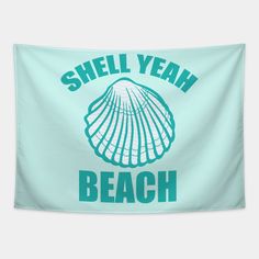 a blue beach towel with the words shell yeah on it and an image of a seashell