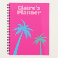 a spiral notebook with the words claire's planner written in pink and blue palm trees