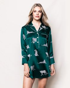 Boasting a prowling panther print atop a lustrously emerald green backdrop, our bestselling Panthere de Lux set is the playful update you need for your nighttime repertoire. Crafted from 100% 22mm Mulberry silk completed with contrasting piped trims, lending refinement to your lounging edit. Our tailored nightshirt is cut to the perfect length, with elegant cuff piping and pearly buttons. In our exquisite sleepwear, you will be tucked in love and off to dreamland. Emerald Green Backdrop, Panther Print, Luxury Sleepwear, Green Backdrops, Shoe Size Conversion, Night Shirt, Shoe Size Chart, Mulberry Silk, Emerald Green