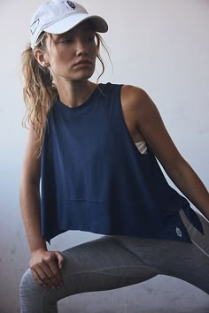 Turn up the tempo in this featherlight tank, with a sweat-wicking finish and a relaxed silhouette that brings a breath of fresh air to your every move. **Fit:** Relaxed fit; arced hem with deep side slits, crew neck **Features:** Airy, sweat-wicking fabrication, four-way stretch fabric that moves with you, relaxed silhouette **Why We ❤ It:** Easy to lounge in, easy to move in, this top keeps you cool and comfortable all day long. | Tempo Tank Top by FP Movement at Free People, Midnight Navy, XL Long Sports Bra, Deep Winter Palette, Workout Style, Long Tank, Preppy Summer, Fp Movement, Breath Of Fresh Air, Midnight Navy, Workout Tanks