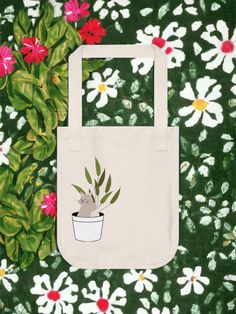 Designed with nature-approved materials, these canvas tote bags come with a 100% certified organic cotton body and web handles. The open main compartment adds daily function with easy access. .: 100% Certified Organic Cotton .: Medium-heavy fabric (9 oz/yd² (305 g/m Plant Print Tote Bag For Gift, Everyday Cat Design Tote Bag, Black Tote Bag With Cat Design, Multicolor Tote Bag With Cat Design, Eco-friendly Tote Bag With Cat Design, Open Main, Island City, Long Island City, The Plant