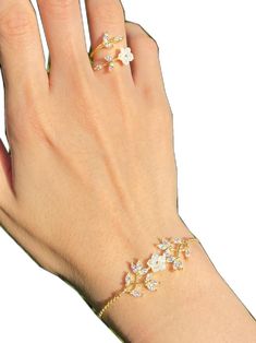 Dainty Flower Wedding Jewelry, Dainty Flower-shaped Wedding Jewelry, Dainty Flower Jewelry For Wedding, Gold Flower Bracelets For Wedding, White Sterling Silver Crystal Bracelet For Wedding, Delicate Flower Wedding Jewelry, Flower Shaped Cubic Zirconia Jewelry For Wedding, Delicate Bangle Jewelry For Wedding, Delicate Cubic Zirconia Bracelet