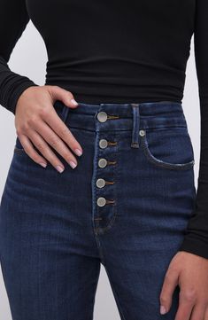 These skinny jeans are made from stretchy denim with exposed buttons that spotlight its gap-proof, contoured high waist. LycraXFit technology brings four-way stretch to the denim so you can move seamlessly throughout your day. 29" inseam; 10" leg opening; 11 1/2" front rise; 15 1/2" back rise (size 10) Exposed-button fly Five-pocket style 93% cotton, 5% Lycra® elastomultiester, 2% Lycra® spandex Machine wash, tumble dry Imported Black Owned/Founded Fitted Medium Wash Pants With Button Closure, High Rise Flare Jeans With Buttons For Fall, High Waist Stretch Jeans With Buttons, Stretch High Waist Jeans With Buttons, Stretch High-rise Flare Jeans With Button Closure, Fitted Mid-rise Flare Jeans With Button Closure, Fitted Dark Wash Jeans With Snap Buttons, Stretch Straight Leg Jeans With Buttons, Mid-rise Bottoms With Snap Buttons For Fall