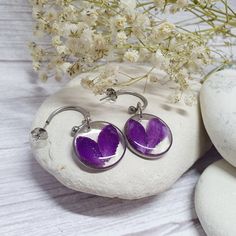 These beautiful, handcrafted earrings with real dry purple flower petals are the perfect gift for her, whatever the occasion may be. -Amazing feature -  Removable charm to transform your earrings into classical style. Gently remove the charm from the hoop and enjoy new possibilities. Ideal birthday gift for young women or beautiful addition to your jewellery collection.  I know that you value quality and safety. That's why I only use the highest quality metals to avoid skin allergies. Specially selected and hand-picked real flowers make this jewellery more unique and special. Simply add to basket, add your free gift note and checkout! Meaningful gift giving, without the stress.  WHAT'S INCLUDED  These bespoke earrings comes in the jewellery box ready to be gifted. Polishing Cloth & Care In Silver Birth Flower Earrings As Gift For Her, Silver Pressed Flowers Earrings For Gift, Pressed Flowers Sterling Silver Drop Earrings, Silver Drop Earrings With Pressed Flowers, Sterling Silver Drop Earrings With Pressed Flowers, Gift Lavender Nickel-free Earrings, Nickel-free Lavender Earrings Gift, Handmade Minimalist Purple Earrings, Handmade Purple Earrings For Her