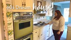 a woman standing in a kitchen next to an oven and stove top with the words, 60's dream house