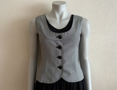 "Women's Vest Grey Vest Gray Women Vest Steampunk Waistcoat Formal Fitted Waistcoat Classic   Measurements (lying flat): Length(back): 20\"/ 51 cm Pit to pit: 17\"/ 43 cm Waist: 14 1/4\"/ 36 cm Please check measurements to insure a proper fit. Remember to allow yourself some extra room for movement. You can compare these with something from your closet that fits you well. Condition: great Vintage Condition N.B. Color may slightly differ from picture SHIPPING * I ship worldwide via Priority mail Fitted Punk Style Vest Outerwear, Punk Style Fitted Vest Outerwear, Punk Style Fitted Vest For Fall, Fitted Punk Style Winter Vest, Winter Punk Style Fitted Vest, Gothic Vest With Buttons For Fall, Fitted Vest For Spring Alternative Fashion, Gothic Button Vest For Fall, Fitted Punk Winter Vest