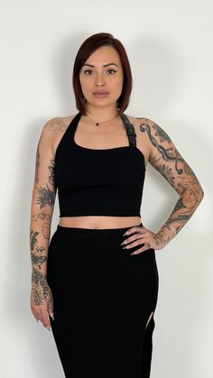 Get ready to turn heads in our Benji Buckle Halter Top—where edgy meets effortless. With its sleek faux leather accents and stylish buckle details, this top is anything but basic. The stretchy ribbed fabric hugs your curves and provides all the support you need, meaning no bra required! Whether you're dressing it up for a night out or keeping it cool for a casual look, this tank gives you the confidence to slay the day (or night) without the fuss. Bold, comfortable, and totally freeing—what’s no Jewelry Words, Jumpsuit Jacket, Ribbed Tank Tops, Leather Buckle, Sweater Pants, Unisex Clothing, Dress Romper, Halter Top, Set Dress