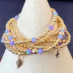 Exquisite Gold Bracelet with Purple Opal Our ornate "Grapevine Vineyard" Gold Bracelet, stacked beautifully with vivid purple opal is an exquisite piece that is designed with utmost precision for the confident, modern woman. With its radiant gold and vibrant purple hues, this bracelet brings in an element of luxurious elegance, yet can be styled for an easygoing, everyday look. PURCHASE OPTIONS Can be purchased individually - individual bracelets are numbered in photos OR You can purchase them a Gold Bracelet Stack, Gold Bracelets Stacked, Purple Opal, Fun Bracelet, Vibrant Purple, Initial Bracelet, Silver Bangle Bracelets, Chunky Necklace, Cool Necklaces