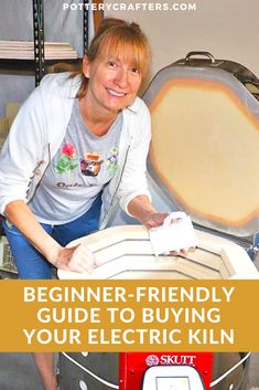 a woman is smiling while cleaning an electric kiln with the words, beginner - friendly guide to buying your electric kiln