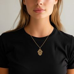 Elevate your style with our gold Hamsa hand pendant. This solid gold necklace showcases exquisite craftsmanship, symbolizing protection and blessings. The 14 karat gold Hamsa Hand pendant is more than just jewelry; it's a fine representation of symbolism and cultural significance, also available in 18k yellow gold. PENDANT INFORMATIONThis pendant is made of real, solid gold.• Made in USA• Material: 14k or 18k solid gold• Finish: polished• Height: 1.25" (32 mm) x Width: 1" (24,5 mm)• Pendant weig Traditional 14k Gold Medallion Necklace, Yellow Gold Plated Amulet Medallion Necklace, Amulet Style Gold Plated Medallion Necklace, Amulet Style Yellow Gold-plated Medallion Necklace, Amulet Style Gold Plated Medallion Necklace In Yellow Gold, Amulet Style Gold-plated Medallion Necklace In Yellow Gold, Spiritual Yellow Gold Plated Necklaces, Yellow Gold Plated Spiritual Necklace, Spiritual Yellow Gold-plated Necklaces