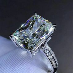 an engagement ring with a princess cut diamond