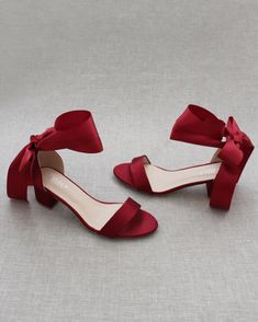 "Classy satin block heel with satin ribbon ankle tie. Simple yet elegant are great combination and will definitely be a favorite. DETAILS: FIT: RUNS LARGE, ORDER ONE SIZE DOWN HEEL HEIGHT: 1.5 inch (Kids) & 2 inches (Women) RIBBON WIDTH: 1.5 inches COLORS AVAILABLE: Black, Burgundy, Champagne, Ivory, Navy, White, Light Blue, Soft Blush UPPER: Synthetic upper and lining MATERIALS: Mandmade outsole STYLE NAME: NAOMI KIDS SIZES: Size 11- 7.65 inch Size 12 - 7.85 inch Size 13 - 8.15 inch Size 1 Short Red Heels, Quince Shoes, Red Kitten Heels, Kids Wraps, Women's Slip Ons, Holiday Shoes, Bridesmaid Shoes, Blue Soft, Red Heels