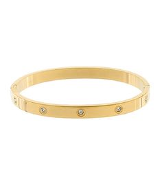 Elevate your style with our stunning Gold Bangle. Crafted from high-quality gold metal, this bracelet exudes elegance and luxury. A perfect accessory for any outfit, it adds a touch of sophistication to your look. Upgrade your jewelry collection today and make a statement with our Gold Bangle. Luxury Metal Bracelets For Wedding, Trendy Formal Bangle, Plated Metal Bangle Bracelets, Plated Metal Bangle Bracelet, Metal Plated Bangle Bracelets, Luxury Metal Bracelets With Plating, Chic Metal Cuff Bracelet For Wedding, Elegant Rose Gold Crystal Bracelet, Chic Gold Bangle Bracelet For Party